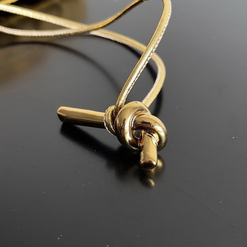 Bottega Veneta Andiamo Clutch with Handle in Gold Metallic Leather Bottega Veneta Andiamo Clutch with Handle in Gold Metallic Leather