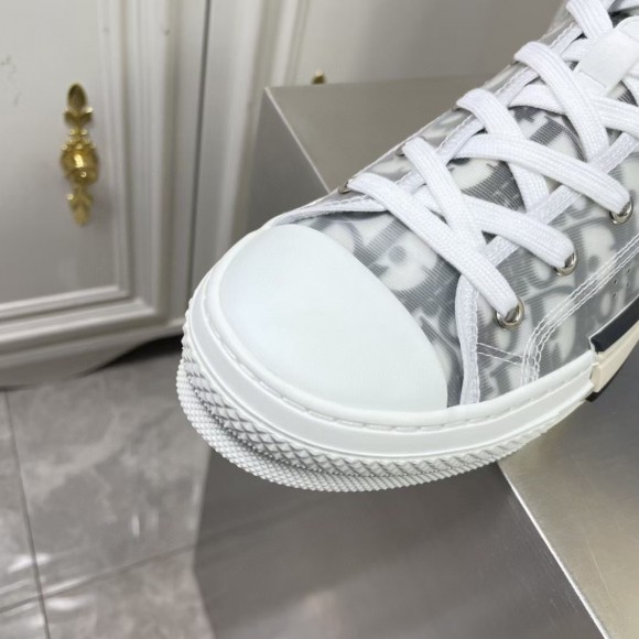Dior Men's B23 High-top Sneakers In White and Black Oblique Canvas Dior Men's B23 High-top Sneakers In White and Black Oblique Canvas